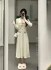 Casual Dresses TEROKINIZO Koreanische Chic Strickkleid Frauen Drehen Unten Kragen Langarm Schlanke Taille Weibliche Mode Sanfte Robe Femme