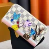 Luxury Designer Card Holder av högsta kvalitet Mini Wallet äkta Leather Fashion Womens Vivi Enne Holidays Children Purses Credit Coin Cartoon Flower Charm Mini Bag