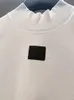 デザイナー女性の Tシャツニットスリムフィットニット新しいプリントレタープルオーバー長袖スポーツ女性のショートトップパターン Tシャツ