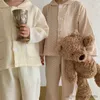 パジャマの子供用服の女の子ラウンジウェアスプリングコットンポルカドットボーイパジャマベイビーのためのスーツカジュアルソリッド幼児服R231108