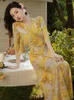 Sukienki swobodne Summer Lady Beach sukienki romantyczny elegancki design żółty druk luźny seksowny szczelin