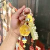 Creative oil wind chime floating keychain hanging exquisite girl bag pendant claw machine stall small gift wholesale