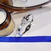 Designer di gioielli Bracciale di lusso Bracciale in cristallo da uomo Polsino da donna di marca Polso largo placcato oro 18 carati con motivi in acciaio inossidabile di alta qualità