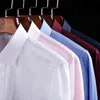 Chemises décontractées pour hommes Chemise en sergé blanc à manches courtes pour hommes coupe ajustée couleur unie robe formelle d'affaires chemise en coton pour hommes résistant aux rides sans fer 230408