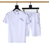 2023 メンズジャージ衣装新パターンデザイナージャージサマースーツ Tシャツシーサイドホリデーシャツショートパンツセット
