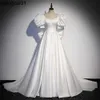 Robes de fête robes de mariée robe de désherbage en satin A-line seves big arc robes nues avec train de balayage 0408h23