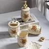 Badtillbehör Set europeiska målade blommor Keramiska badrumsredskap Guld Press Lotion Bottle Tandborste Holder Mouthwash Cup Accessories