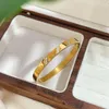 Bracciale a clip in acciaio inossidabile placcato oro 18 carati con zirconi bianchi, braccialetto a clip per le donne, regalo di gioielli con ciondoli