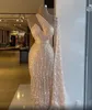 Arabiska aso ebi guld lyxiga glittrande aftonklänningar pärlstruckar paljetter prom klänningar fjäder formella parrty andra mottagnings klänningar