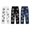 Flower Full Print Jeans byxor överdimensionerade streetwear raka casual män och kvinnor denim byxor vintage kapok tryck graffiti high street raka ben jeans