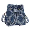 Umhängetaschen Denim Edge Bucket Bag Fasion Designer Crossbody Body Plaid Soulder Bag PU Draw String PUSS Messenger Bagcatlin_fashion_bags