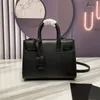 Sac à main de luxe de créateur Fourre-tout noir Sacs à main de haute qualité Plaine Lettre ouverte Lady Hard Solid Bag Fashion Womens Bag designers Straddle Bags Cuir de vache Crossbody MM