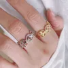 Designer smycken mode klöver guld pläterad silver charm finger ring blomma form öppen justerbar inlagd zirkonring för smycken tillverkning leverans