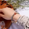 Bracelets de charme Bracelet élégant en pierre de lune grise avec cristal de fraise et quartz de cheveux jaunes pour femmes