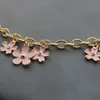 Llaveros Bolsa de lujo Charm Chain Llavero para mujer Pink Flower Bag Colgante Decoración Accesorio Metal Hebilla Anillo Regalo de cumpleaños 230408