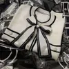 Maglioni da donna Designer Donna Maglione lavorato a maglia Papillon di lana Autunno Ragazze Lana con camicia a maniche lunghe in maglia di perle Abiti di moda super elastici UOBL