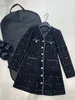 2023 Otoño/Invierno nuevo negro tejido a cuadros edredón con cuello en V manga larga A-line vestido Midi mujeres falda de longitud media