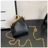 Bolsa de grife 2023 Summer Tote 20% Off Women Spring Personalidade Simples Irregular Messenger Metal Clip Chain NZCB