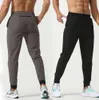 Luu bayan erkek jogger uzun pantolon spor yoga kıyafeti hızlı kuru çizim sporu cepleri eşofmanlar pantolonlar erkek gündelik elastik tozluklar moda all-maç