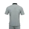 Survêtements pour hommes Hommes Outfit Set 2023 Européen Américain Vêtements d'été Tendance Jeunes Loisirs Sports Costume Mode T-shirt Pantalon 2 pièces