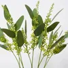 Dekorativa blommor konstgjorda eukalyptusblad med frukt mjuk gummiteknik landskapsarkitektur vardagsrum dekoration gröna växter