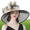 FS paarse dames fascinator hoeden bruiloft Kentucky derby hoeden voor vrouwen bloemhoeden grote brede fedora organza hoed kerk 201108780964