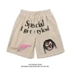 Shorts pour hommes Shorts d'été pistolet élément imprimer femmes homme genou pantalon Harajuku femme lâche taille haute cinq points pantalon dessin animé y2k Man Shorts 230408