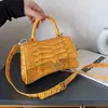 2024 New luxury high quality handbag trend spring hand minis leather stone pattern