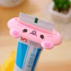 500 Uds 9*4cm Animal de dibujos animados plástico exprimidor de pasta de dientes baño soporte para cepillo de dientes juegos de baño productos para el hogar accesorios de cocina creativos herramienta de baño