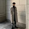 Piumino da uomo Parka Trench di tendenza coreano Tinta unita Doppio petto Giacca a vento lunga Primavera Autunno Oversize Cappotto allentato di media lunghezza 231108