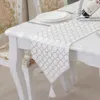gold and silver table runner