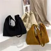 ショルダーバッグ2023新しいストライプハンドヘルド女性用シンプルなもののための大きなバッグTotecatlin_fashion_bags