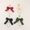 Pearl KeyChain Handgjord mobiltelefon hänge stor bowknot strängpåse hörlurar tillbehör ryggsäck charm lyxigt tillbehör