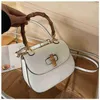 2024 Nouveau concepteur pour femmes crossbody épaule femelle section bambou selle portable selle de loisirs simple messager petit sac carré