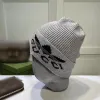 Designer clássico outono inverno estilo quente gorro chapéu de malha chapéus homens e mulheres moda universal boné de malha outono lã ao ar livre quente crânio bonés G2311910PE-5