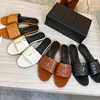 2024 Slajdy damskie Designerskie Kapcia Pinią Polaki Płody Flats Sandały Oryginalne skórzane buty Black Ladies Slipper