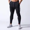 Pantaloni da uomo Uomo Casual Skinny Jogging Pantaloni sportivi da corsa Maschile Pure FootTrack Tasche con cernieraPantaloni da allenamento Fitness da palestra