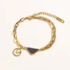 Bracelet en or plaqué bracelet de créateur pour hommes chaîne de lettres ornement quotidien bijoux de luxe à la mode bracelet à breloques en acier inoxydable pour femmes classique populaire zb089