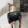 2024 New Designer womens crossbody shoulder Batch of fashionable hands bamboo half round minority teacher saddle bag