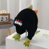 Berretti Cappelli Cappello da dinosauro per bambini Autunno Inverno Stile Maglia addensata Berretto da cartone animato Paraorecchie per bambini Mantieni caldi berretti Cappelli adorabili dei cartoni animati 231108