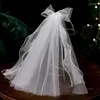 Bridal Veils 2024 Simple Pencil Edge Bow Wedding Veil Short Lace Fuffy 2 Tier For Woman Bride Hair Accessories Beach Party Velo De Novia