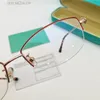 Lunettes optiques pour femmes, nouveau design de mode, petite forme ovale, demi-monture en métal, style simple et élégant, lentilles claires, 2131