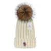 Top vente véritable casquette de boule de fourrure chapeau d'hiver pour les femmes unisexe laine tricoté coton tempérament de luxe polyvalent tricoté chapeau chaud Design chapeau ak2
