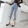 Vrouwen Jeans Vrouwen 2023 Zomer Mode Hollow Out Cross Strap Bandage Denim Potlood Broek Dames Mid Taille Sexy Lace up Gat Strak