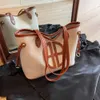 Frauen Handtaschen CE Bucket Messenger Bag Designer Cel Leinwand geteiltes Lederschaufel Beutel Cowide hat eine schöne Kapazitätskontrastfarbe großer Kapazitätsbeutel für Frauen ilmv