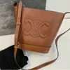 Женские сумочки CE Split Cel Buckte Buckte Buck Bag Sack Canvas Messenger Кожаная сумка дизайнер ковхид имеет красивую мощность триумфальная арка мешок для арки 2024 Новый мини -smal v3li