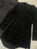 2023 outono/inverno novo preto xadrez tecido edredom com decote em v manga longa a linha midi vestido feminino saia de comprimento médio