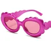 نظارة شمسية جديدة نساء شخصية بيضاوية أشعة الشمس عباد الشمس مضاد للنظارات UV البساطة النظارات حلوى اللون الزينة