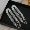 Orecchini pendenti TREAZY Elegante femminile lungo nappa color argento brillante strass orecchino a goccia per le donne gioielli della festa nuziale