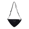 2024 New Designer womens crossbody shoulder Spring and triangle red packet leisure trend niche Messenger female bag